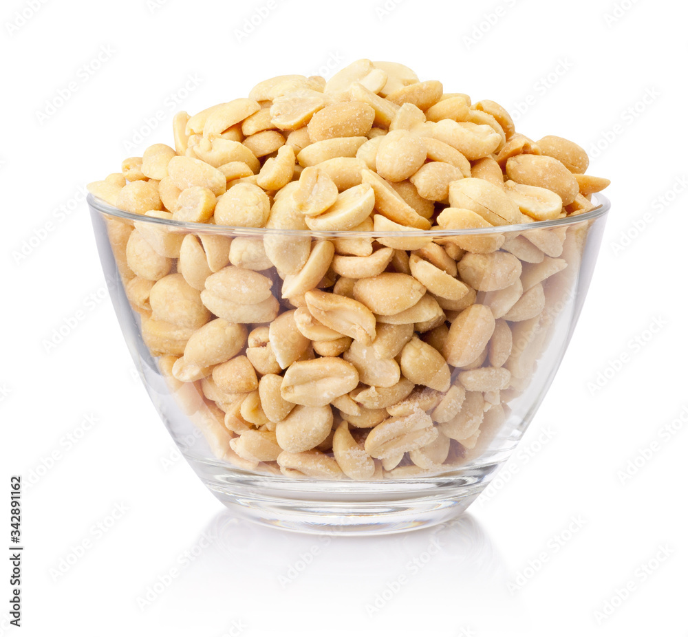 Roasted salted peanuts in glass bowl isolated on a white background - obrazy, fototapety, plakaty 