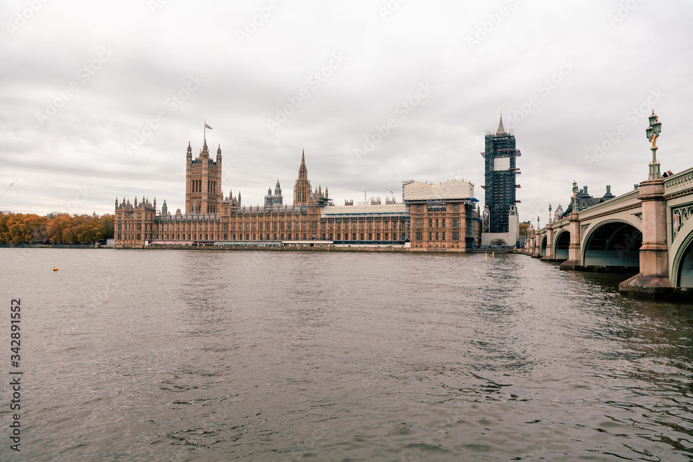 London, UK - November 09, 2020: view on The Palace of Westminster exterior at cloudy weather