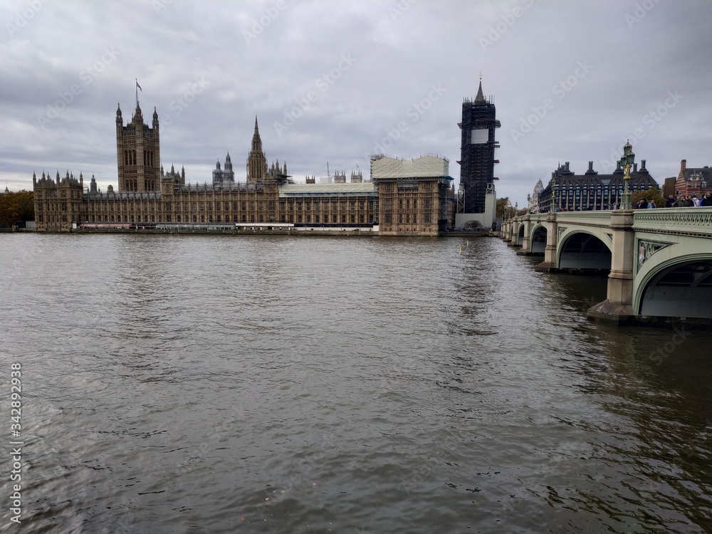 London, UK - November 09, 2020: view on The Palace of Westminster exterior at cloudy weather