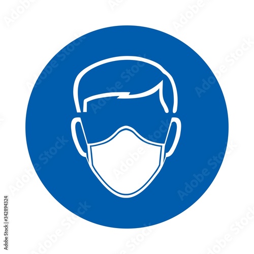 Safety mask must be worn sign or symbol. M016.  Standard ISO 7010.  Vector design isolated on white background . photo