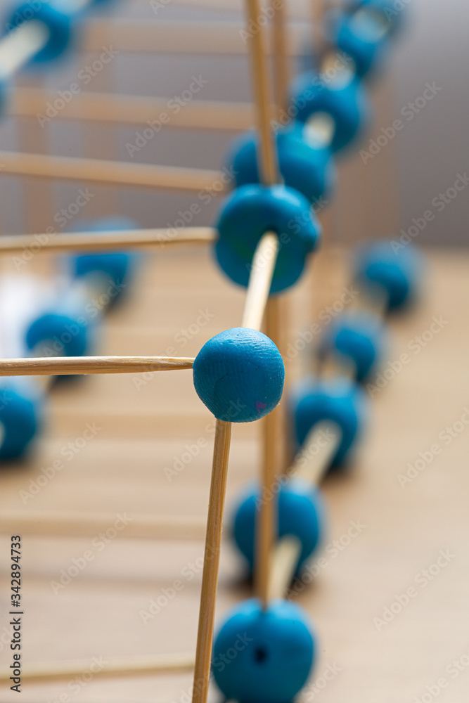 Plasticine and toothpicks building kid's game homemade close up perspective