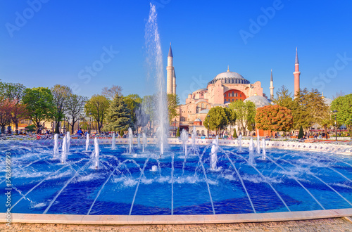 Istanbul, Turkey. The view through fountain at Hagia Sophia and Sultan Ahmet Park.