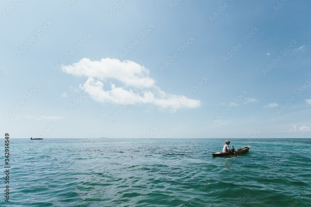 Semporna, Sabah, Malaysia - 26 April 2020 - Sea gypsies on a boat