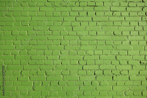 Green brick wall texture.  Background from bricks painted with green paint.