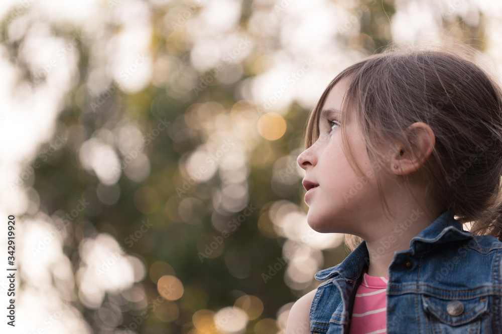 A young girl is feeling emotional about being at home in quarantine during covid-19. A young girl is feeling emotional about being at home in quarantine during covid-19.