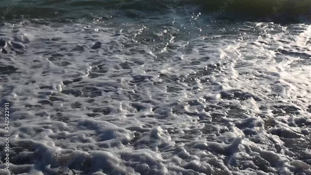 Sea sand beach on which the waves of water come. Sea sand beach on which the waves of water come.