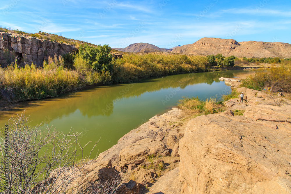The Rio Grande river divides the border of Mexico and Texas. Looking over into Big Bend National Park from the Boquillas side of the park in Mexico.