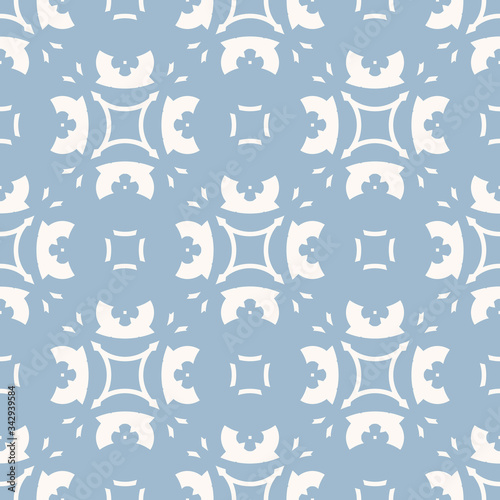 Vector abstract floral geometric ornament. Seamless pattern in soft blue and white colors. Elegant vintage ornamental texture with flower shapes, carved elements. Repeat decorative background design