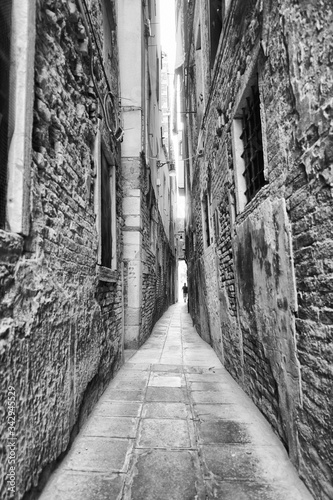 Photography Narrow passageway in Venice, Italy in black and white.