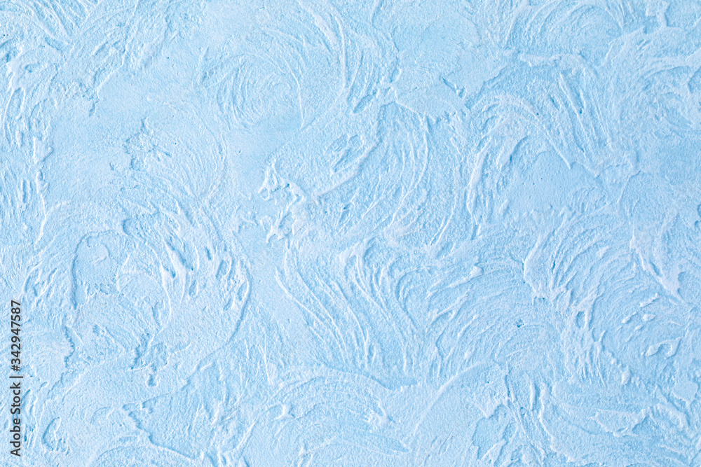 Luxury background with imitation of sea wave. Handmade. Texture of light blue plastered wall with glaze finish. Copy space