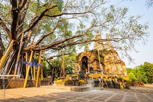 Ancient pagoda in Chet Yod temple photo