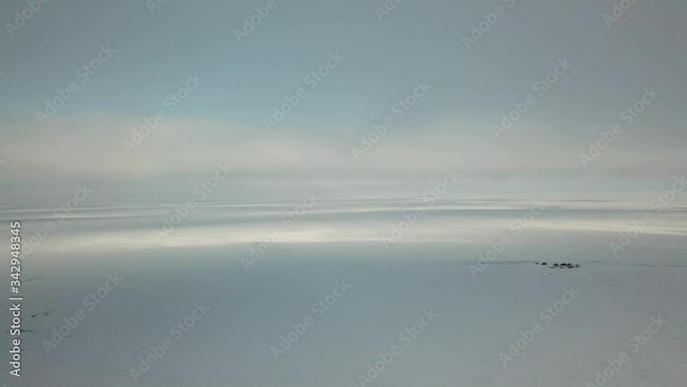 Field camp of geologists in the tundra of the Republic of Sakha. Frozen Surface at Packice Top Flight Drone Shot Footage 4K (UHD) Field camp of geologists in the tundra of the Republic of Sakha. Frozen Surface at Packice Top Flight Drone Shot Footage 4K (UHD)