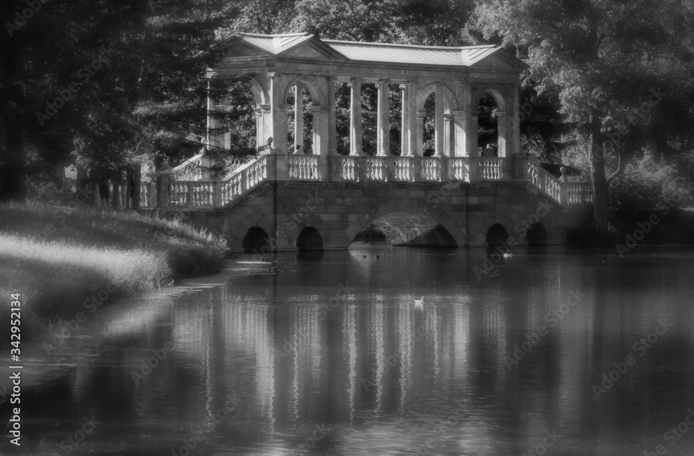 Marble bridge in Catherine Park (Pushkin, Saint Petersburg region, Russia). INFO FOR REVIEWERS: NO TECHNICAL ISSUES ON THIS  IMAGE. SOFT SPOT FILTER  AND BLACK&WHITE MODE WERE USED FOR ARTISTIC EFFECT