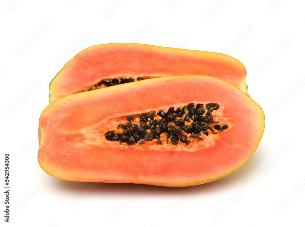 Close up,half papayas isolated on white background. Close up,half papayas isolated on white background.