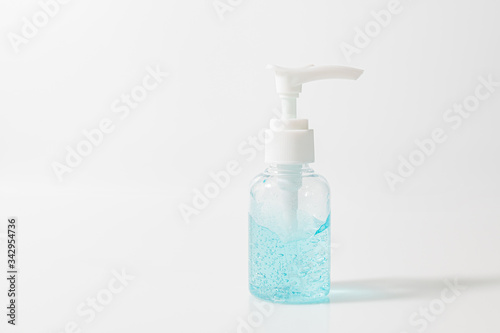 White pump bottle of hand sanitizer gel in  isolated on a white background. Sanitizer gel for corona virus or Covid 19 protection.