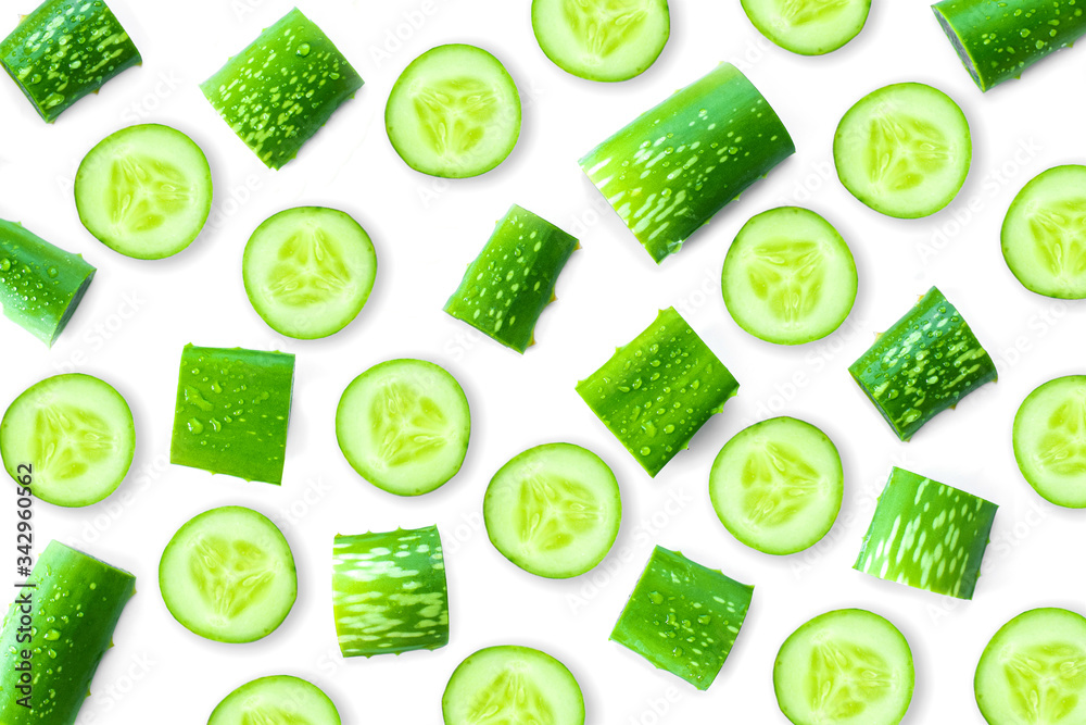 Closeup fresh organic aloe vera and cucumber slice pattern texture for background. Herbal medical plant concept. Top view. Flat lay. Closeup fresh organic aloe vera and cucumber slice pattern texture for background. Herbal medical plant concept. Top view. Flat lay.