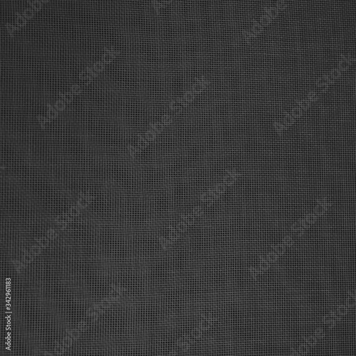 dark abstract background: unique wavy pattern of overlaying two grids, blurred and tinted in gray