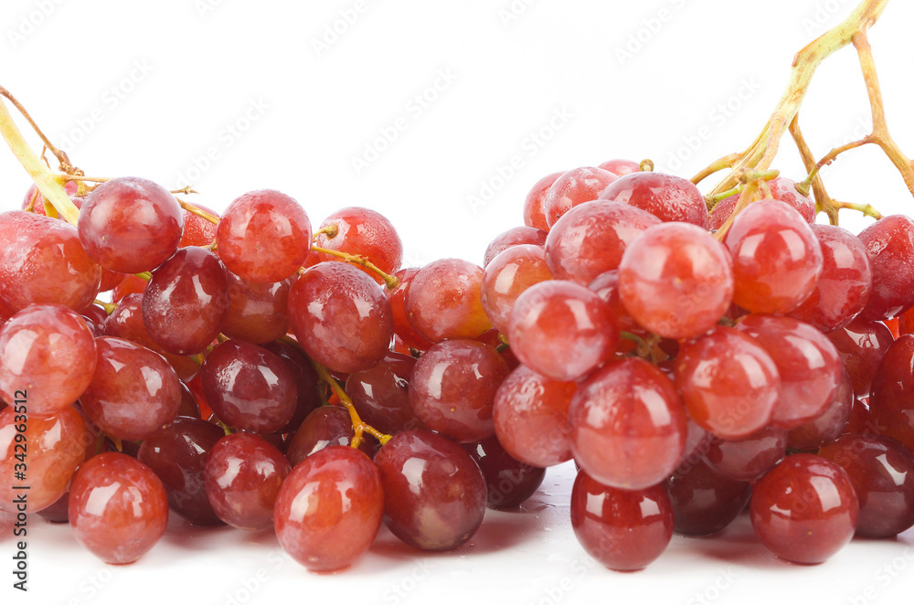 fresh red grapes isolated on white background. fresh red grapes isolated on white background.