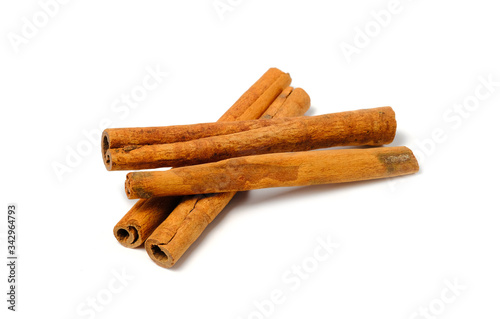 Cinnamon Sticks Stacked isolated on White background closeup macro shot