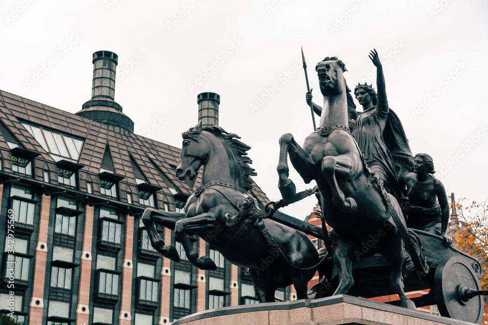 London, UK - November 09, 2020: Statue of Boudicca, warrior queen of the Iceni, Thames Embankment, London. Artist: Derek Anson London, UK - November 09, 2020: Statue of Boudicca, warrior queen of the Iceni, Thames Embankment, London. Artist: Derek Anson