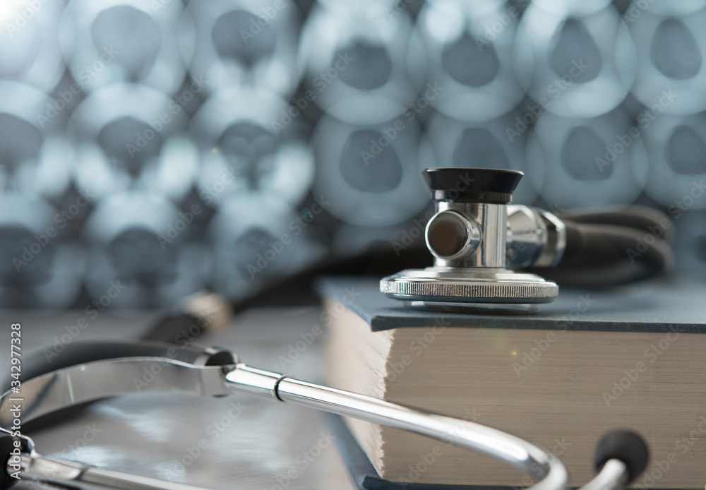 Obraz premium stethoscope medical book