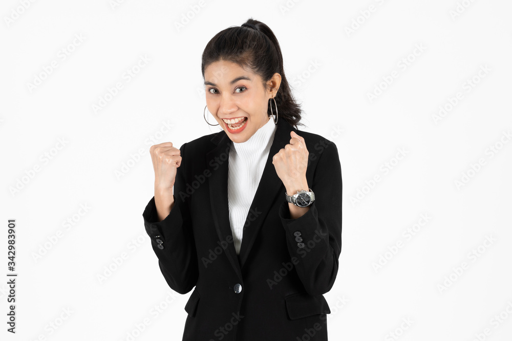 Successful young Asian business woman in suit smiling on white isolated background. Successful young Asian business woman in suit smiling on white isolated background.
