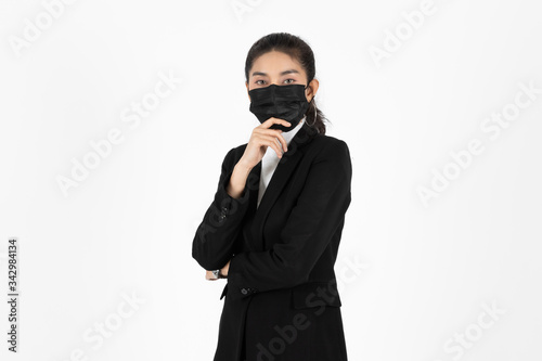 Portrait young Asian business woman in suit wearing face mask on white isolated background. Coronavirus flu virus , Covid 19 , Air pollution pm2.5 concept.