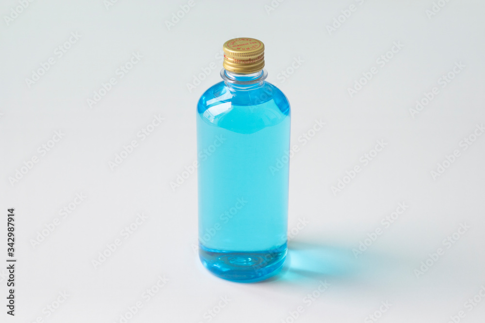Glasses, alcohol-based hand sanitizers, 70% isopropyl alcohol, must have items product during the COVID- 19 pandemic, isolated on white background.