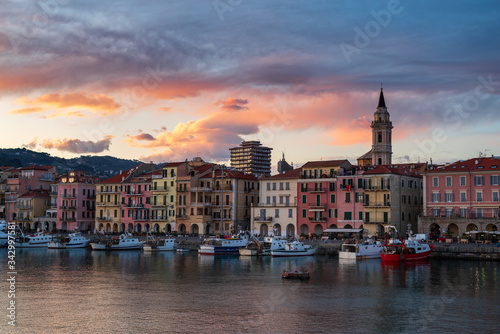 Ancient harbour with fishing boats of Imperia Oneglia in evening, Italy © Dmytro Surkov
