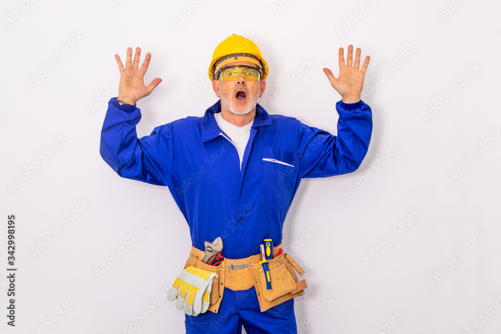construction worker or worker with tools isolated on background with copy-space construction worker or worker with tools isolated on background with copy-space