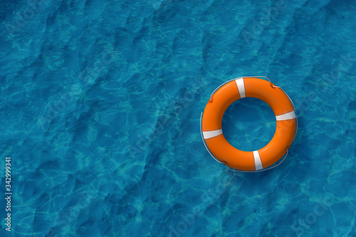 Orange Lifebuoy on the water. The concept of help, rescue, drowning, storm. Copy space. 3D illustration, 3D rendering.