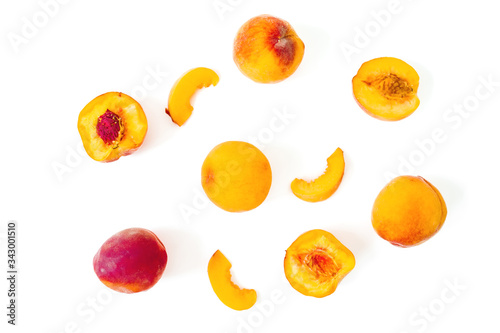 Tasty ripe peaches on white background. Sweet fruits. Top view. Flat lay
