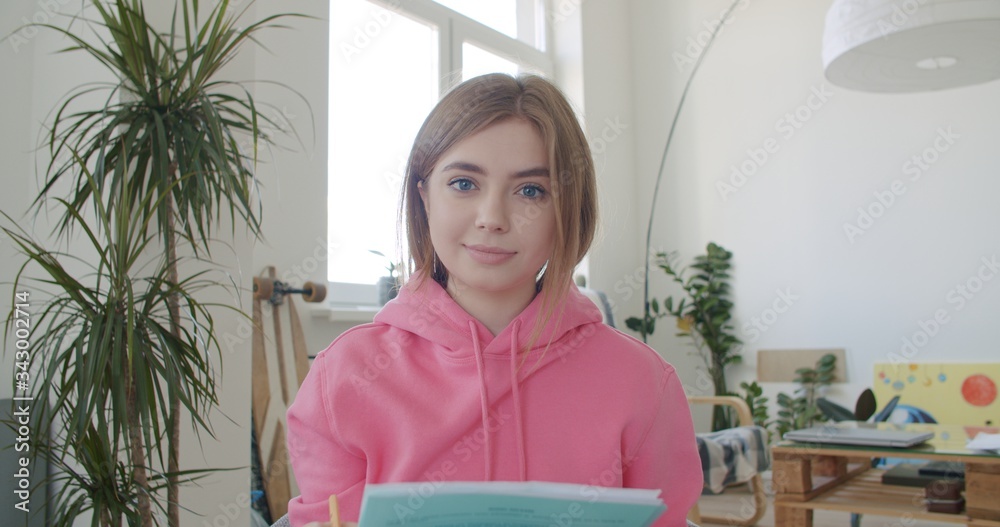 Young woman makes video conference