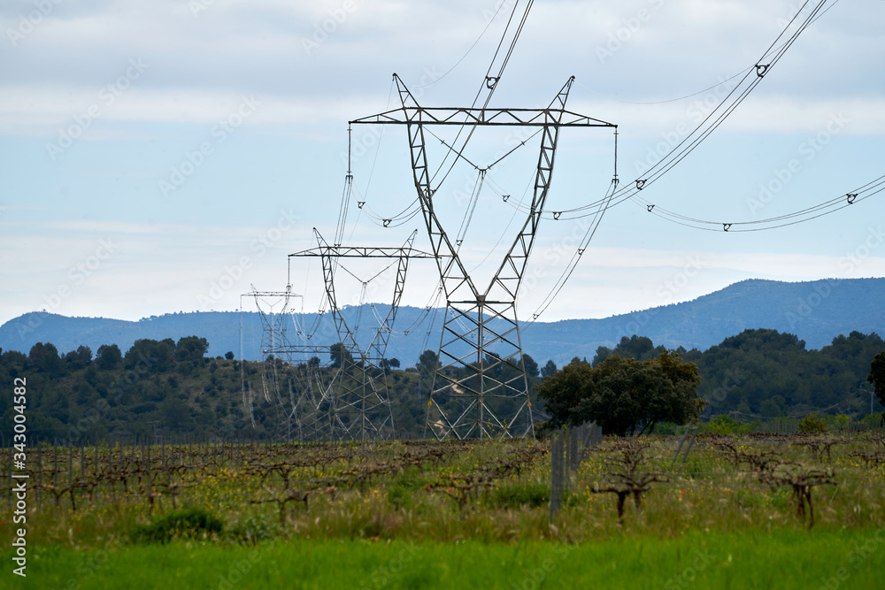 Obraz premium high voltage electricity pylon in a rural area