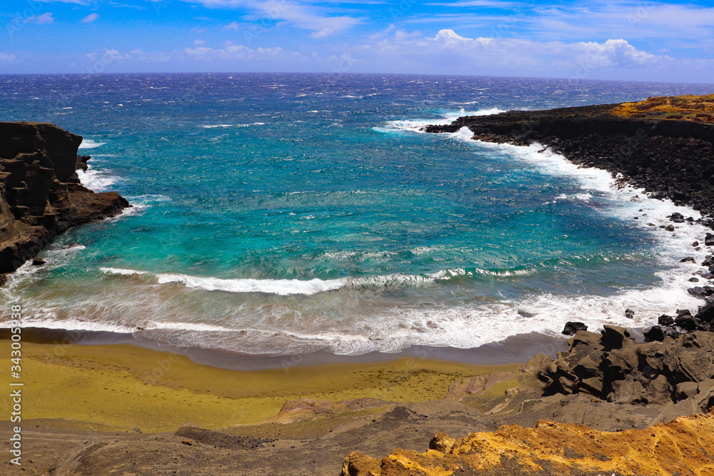 Green Sand Beach on Big Island in Hawaii on a sunny day
