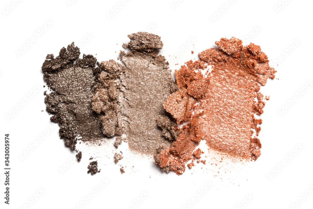 Close-up of make-up swatch. Smear of crushed brown and gray set eye shadow Close-up of make-up swatch. Smear of crushed brown and gray set eye shadow