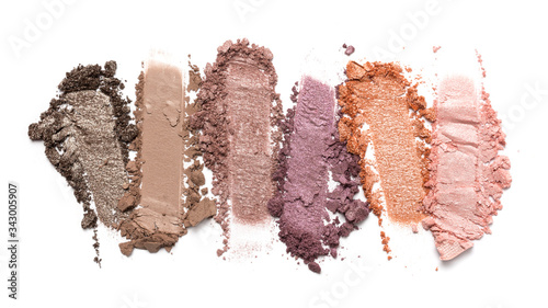 Close-up of make-up swatch. Smear of crushed multicolored set eye shadow