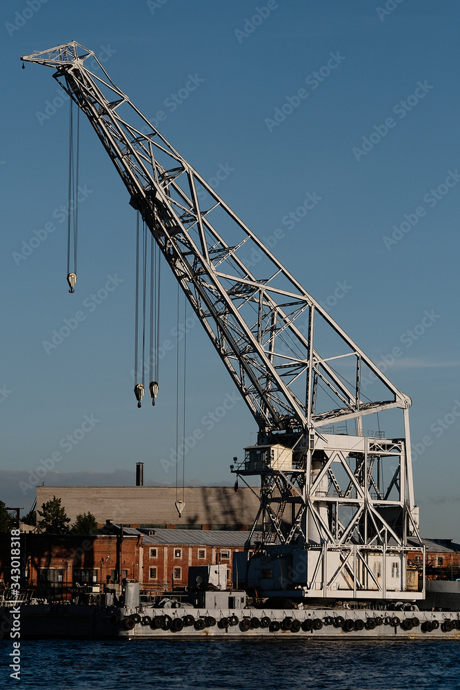 ship unloading crane, evening light, sunset