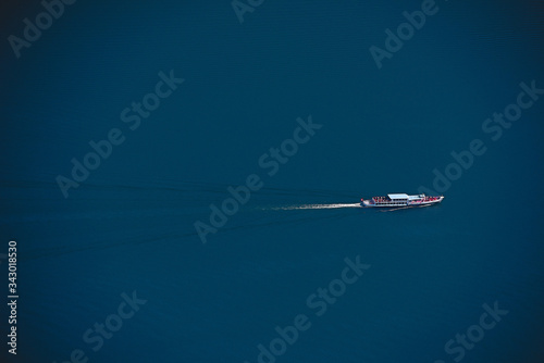 yacht sailing in the sea, top view