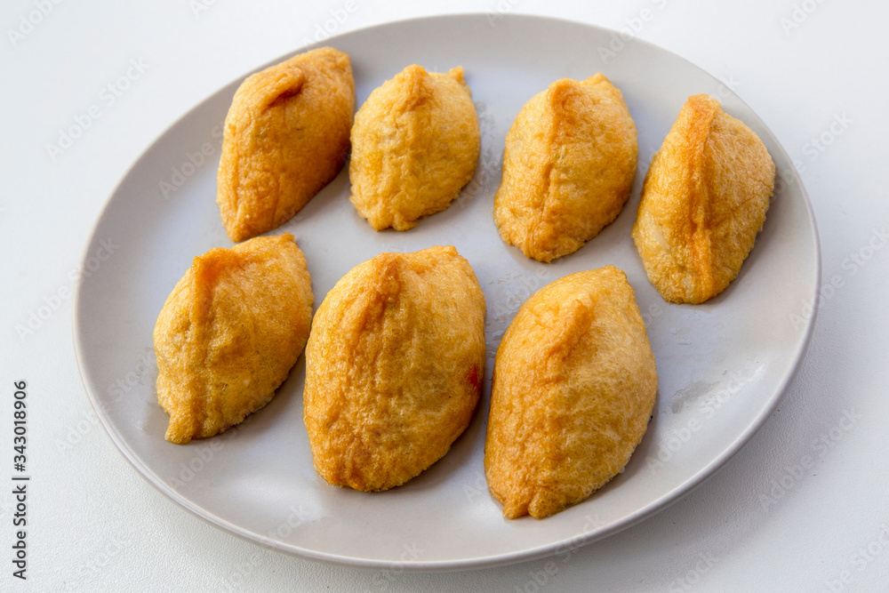 Korean style inari sushi which is fried tofu stuffed with rice
