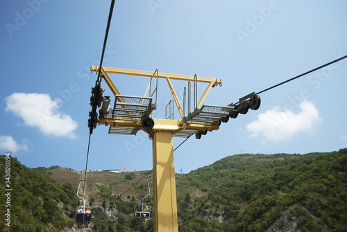 Cable car mast, view of the mountain covered with forest. Gelendzhik, Russia