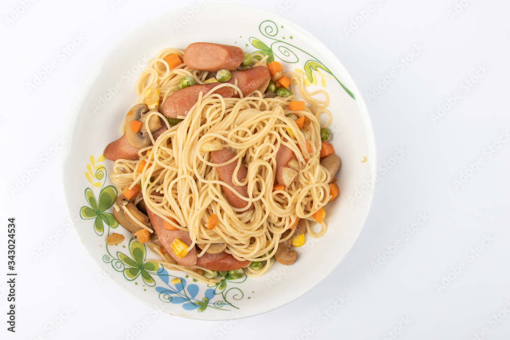Homemade delicious fried spaghetti on White Background.  