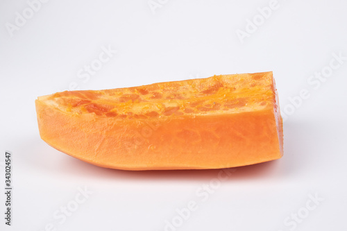Fresh cut papaya on white background.
