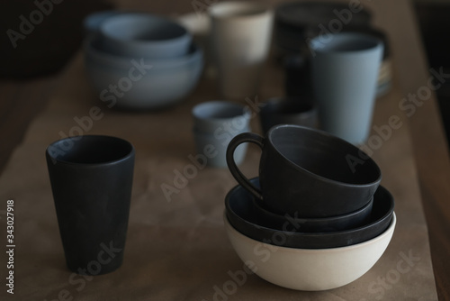 Matt ceramic handmade tableware in a workshop closeup
