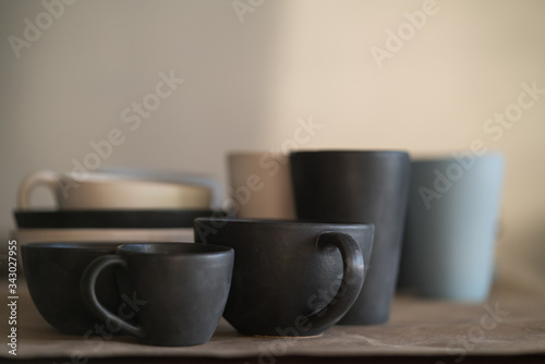 Matt ceramic handmade tableware in a workshop closeup