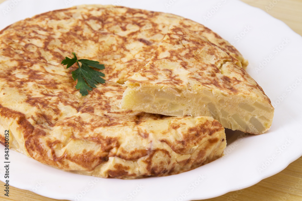 omelette with eggs and potatoes, typical Spanish omelette