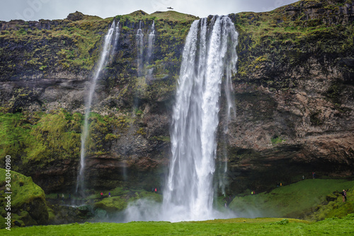 Famous Seljalandsfoss waterfall, part of Seljalands River that has its origin in the volcano glacier Eyjafjallajokull in Iceland