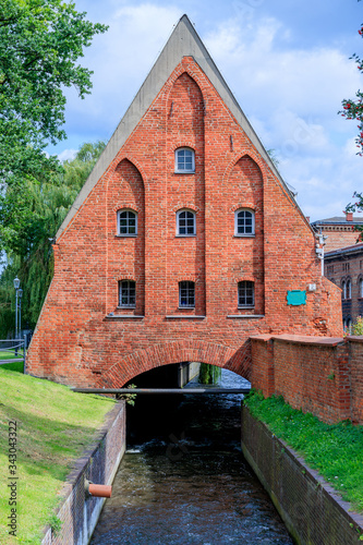 GDANSK, POLEN - 2017 AUGUST 26. Little Mill in the old town of Gdansk. Granary built around 1400 over Raduni River. photo