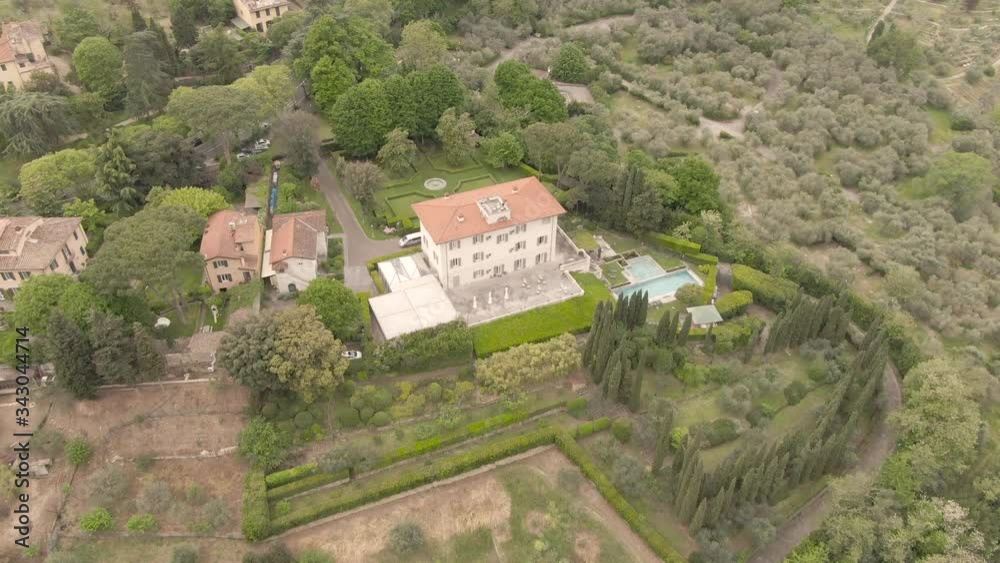 Florence city, Aerial panoramic view. 4K Birdseye drone of Florence in day. View of countryside, mansions, villas, houses in the beautiful tuscan city. Tuscany, Italy. Florence city, Aerial panoramic view. 4K Birdseye drone of Florence in day. View of countryside, mansions, villas, houses in the beautiful tuscan city. Tuscany, Italy.