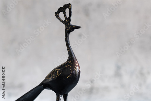 black color metal Peacock sculpture on white background view